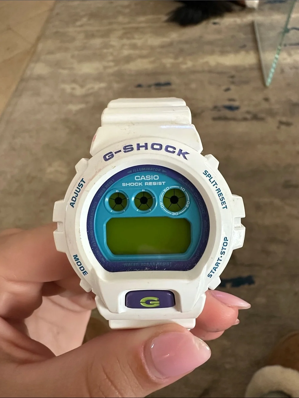 G-Shock White Watch with Blue and Green Accents